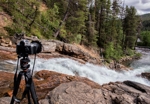 Taking photos of Ravadas Falls in Finland